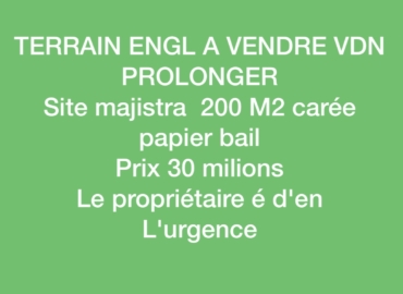 Terrain angle à vendre cité Magistrat